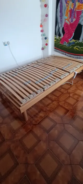 Cama de 1.10x1.90 cm.de laminas automática