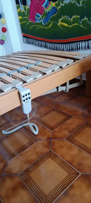 Cama de 1.10x1.90 cm.de laminas automática