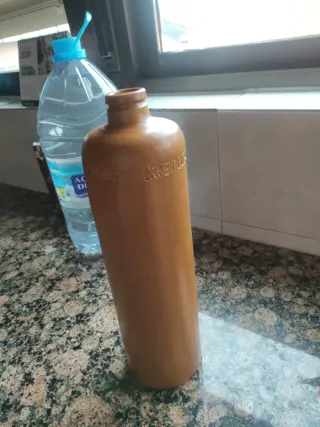 Botella de barro para licor