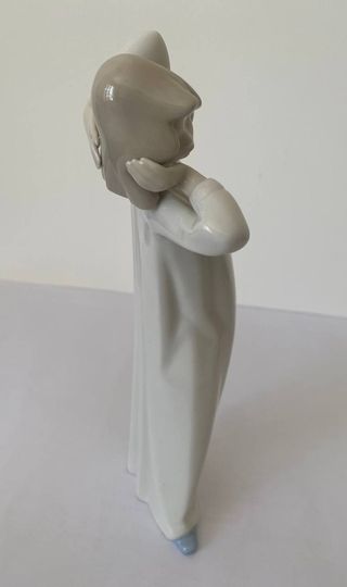 Figura porcelana El despertar de la niña, antigua