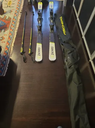 Esquis bastones y bolsa