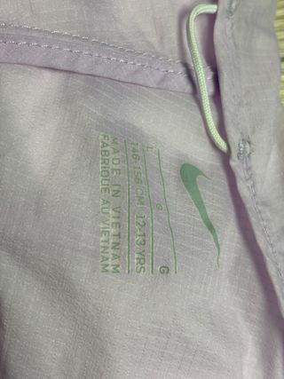 Chaqueta running Nike niña. Talla L