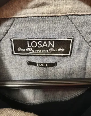 Polo Logan manga larga.