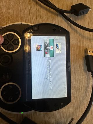 Psp portatile con giochi e caricabatterie