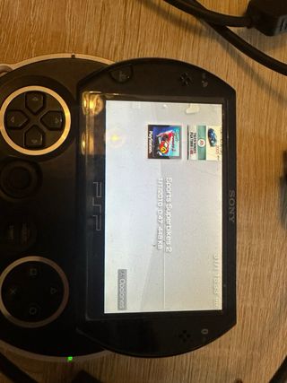 Psp portatile con giochi e caricabatterie