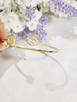 Brazalete Tipo Gota Giratoria chapado en oro 18k