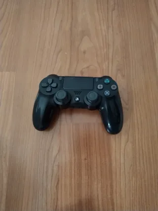 PS4 Slim Nera + Controller + Giochi