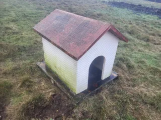Caseta de hormigon para perro grande