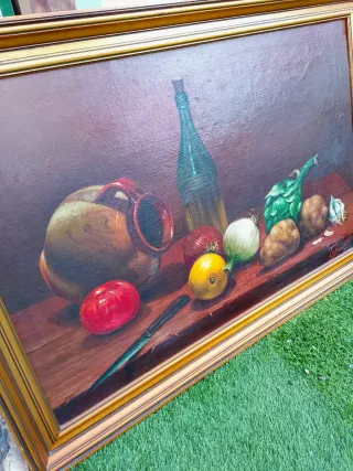 Bodegón oléo sobre lienzo firmado con marco dorado