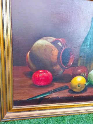 Bodegón oléo sobre lienzo firmado con marco dorado