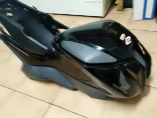 Tapas Honda NC 750Buen Estado color negro