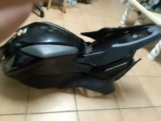 Tapas Honda NC 750Buen Estado color negro