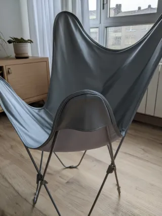 Silla plegable de polipiel en plata