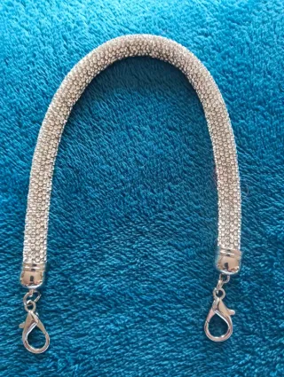 2 manici scintillanti per borsa. Nuovi.