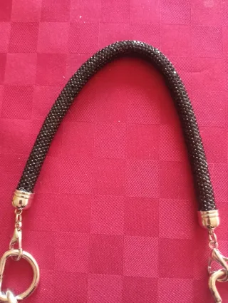 2 manici scintillanti per borsa. Nuovi.