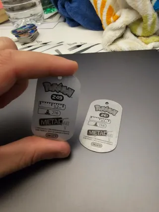 Metal tags pokemon lugia y poochyena