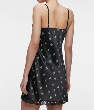 Vestito nero con farfalle