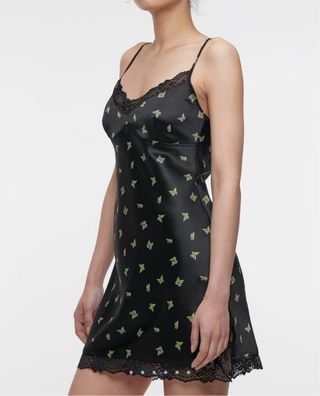 Vestito nero con farfalle