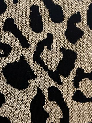 Jersey de hilo print negro y dorado