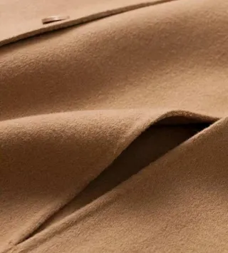 Poncho beige elegante