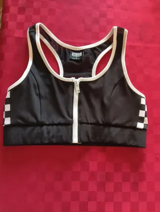 Top nero con zip e inserti a scacchi