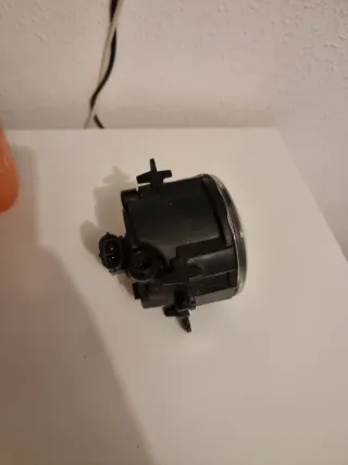 faro antiniebla y tapon  lavaparabrisas megane 3