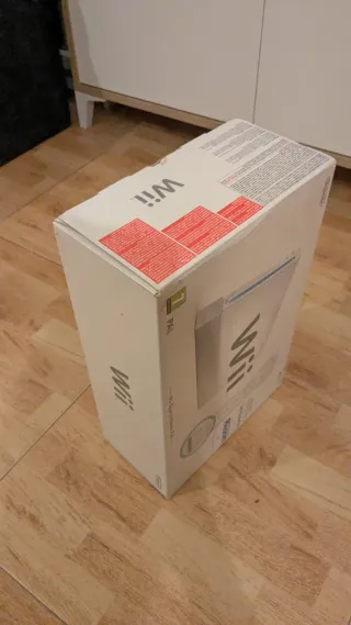 Caja Nintendo wii + wii sport + wii sport resort