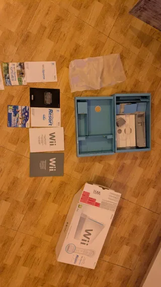 Caja Nintendo wii + wii sport + wii sport resort