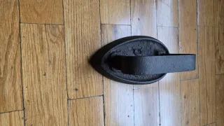 Plancha antigua de hierro fundido