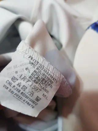 Tuta corta a fiori blu, tg. S / M. Nuova.