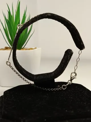 Pulsera plata de ley y pluma