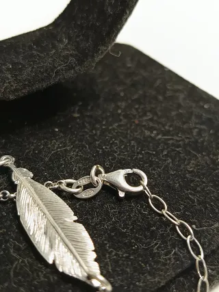 Pulsera plata de ley y pluma