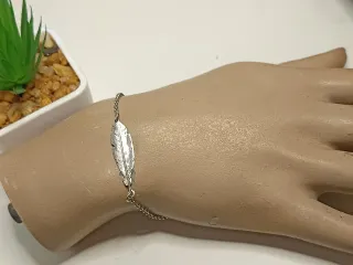 Pulsera plata de ley y pluma