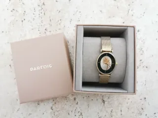 Reloj Parfois dorado con palmera