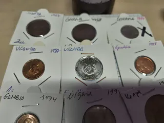 Lote 17 monedas de África.