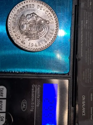 Moneda 5 pesos mexicanos 1948.
