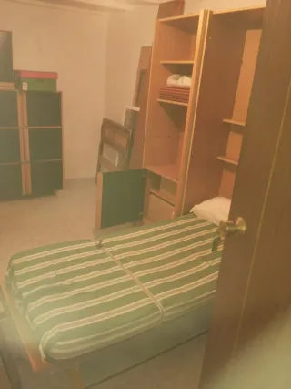 Mueble en tres cuerpos con cama abatible