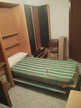 Mueble en tres cuerpos con cama abatible