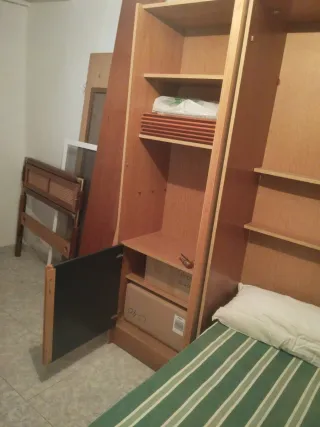 Mueble en tres cuerpos con cama abatible