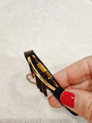 Pulsera  marrón y dorada en perfecto estado