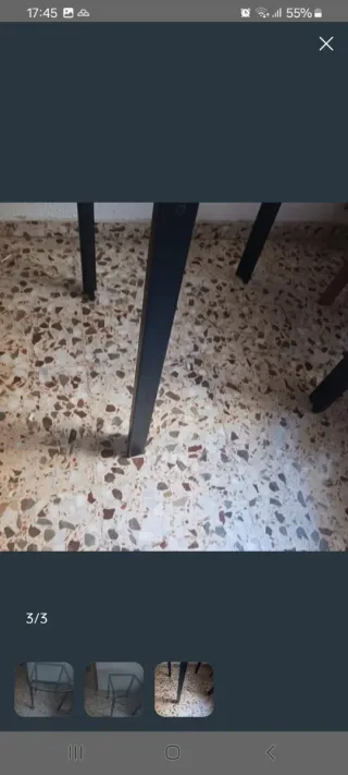 Mesa redonda de cristal y hierro