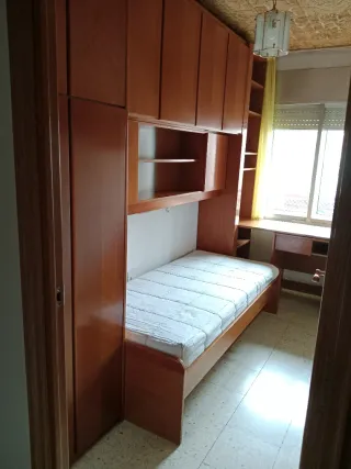 Dormitorio juvenil caoba con cajones cama nido