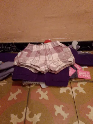 Viendo chaquetitas de bebé niña talla 12M