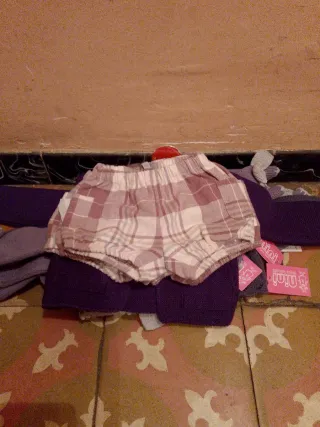 Viendo chaquetitas de bebé niña talla 12M