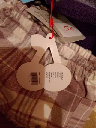 Viendo chaquetitas de bebé niña talla 12M