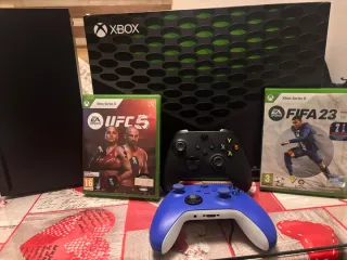 Xbox series x con 2 mandos y dos juegos