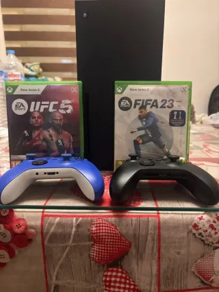 Xbox series x con 2 mandos y dos juegos