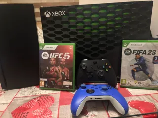 Xbox series x con 2 mandos y dos juegos