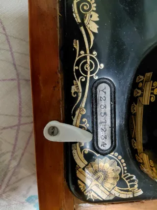 Maquina de coser Singer antigua