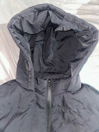 Chaqueton negro sin mangas .